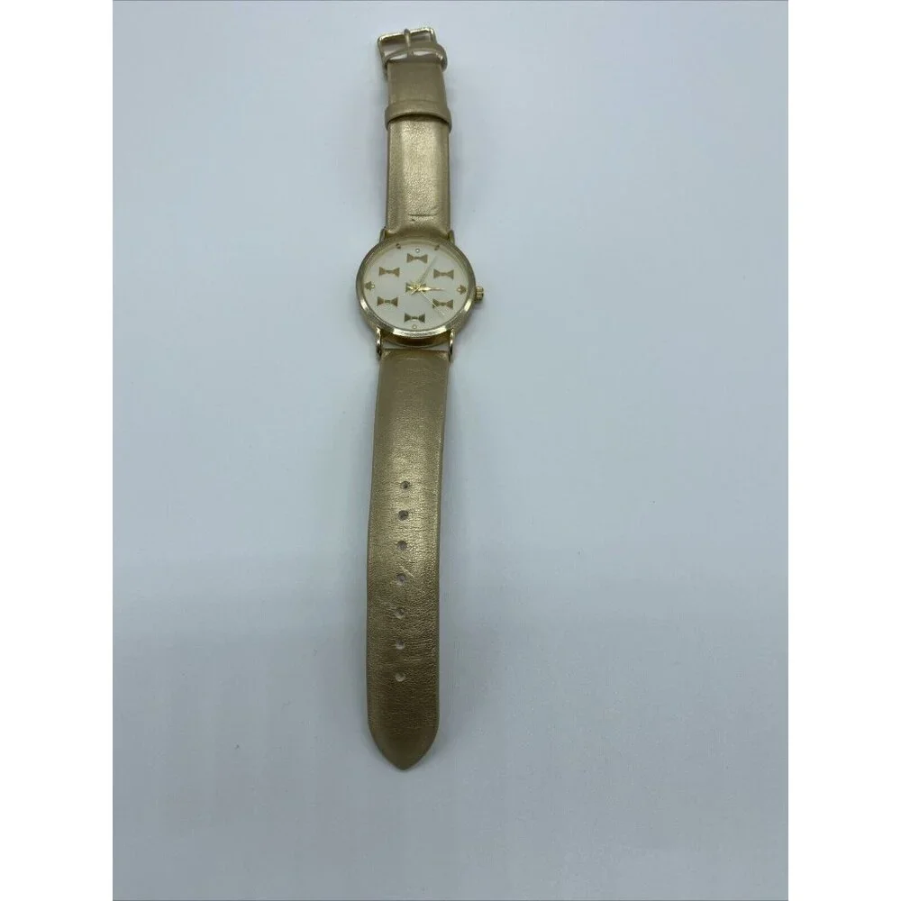 Geneva Platinum No.9880 Women's Gold Band White Face Watch w/ Gold Bowties
